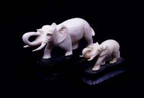 Two Chinese Carved Ivory Elephants