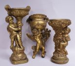 2 Gilt Cherub Floral Stands & a Cherubs Wall Sconce