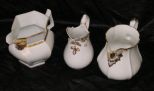 Group of Three Porcelain Pitchers