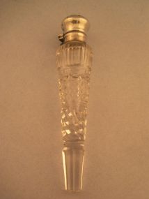 Cut glass Bosom perfume bottle with Sterling top.
