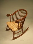 Mahogany Rocking Chair with Lion Head Arms
