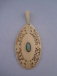 Oval-shaped Pendant, Appears to be Ivory with Turquoise Stone in Center