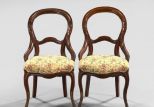 Pair of American Rococo Revival Walnut Balloon-Back Chairs