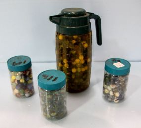 Three Jars and Pitcher of Marbles