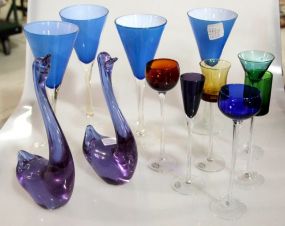 Six Home Essentials Color Liquors & Four Blue Flute Glasses and Pair of Glass Swans