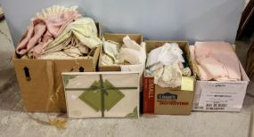 Four Boxes of Napkins, Place Mats & Pillows