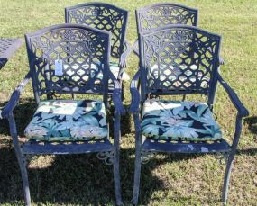 Four Metal Arm Chairs