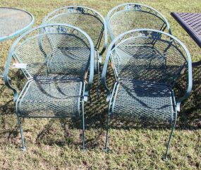 Four Metal Arm Chairs