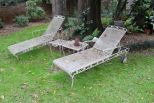 Two Wrought Iron Loungers