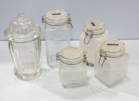 Four Jar Canisters & Old Jar