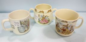 Two Royal Doulton Bunny Baby Cups & One Wedgwood Baby Cup