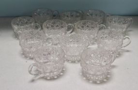 Twelve Pressed Glass Punch Cups