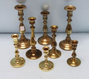 Eight Assorted Brass Candle Holders