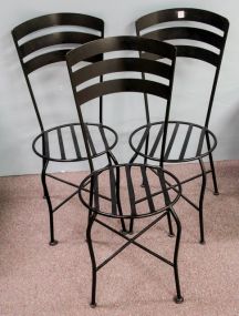 Three Black Metal Chairs