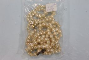 Pair of Pearl Strands with Silver Clasps