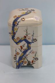 Four Piece Stacked Asian Pottery