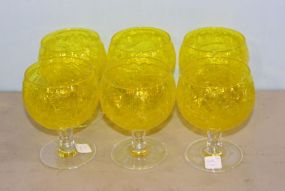 Six Yellow Embossed Glasses with Clear Stems