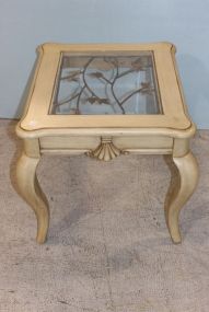 Distressed Cream Colored Side Table with Metal Leaf Design