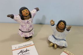 Pair of C. Allan Johnson Alaskan Figurines