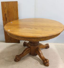 Oak Pedestal Table with Carved Skirt and Hairy Paw Feet