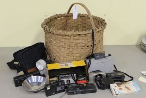 Basket with Vintage Cameras