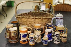 Basket of Pottery Mugs and German Stein