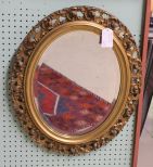 Oval Carved Gold Mirror