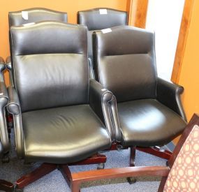 Four Faux Leather Office Desk Chairs