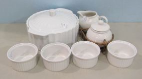 Basic Porcelain By Home Essentials Lidded Casserole, Four Fox Run Custards, a Cream and Sugar Bowl in Metal Frame