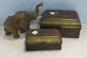 Two Wooden Boxes with Palms and Elephant Decorations and a Carved Wooden Elephant Figure
