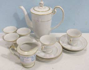 Noritake White with Gold Rimmed Demitasse Tea Set with Pot and Six Cups and Saucers and also a Occupied Japan Hira Creamer