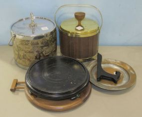 Two Ice Buckets, A Copper Plate, A Stand, A Wood and Tile Trivet, and a Plate Stand