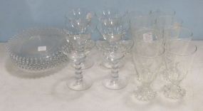 Eight Candlewick Glass Plates, Six Champagne Coupes, and Eight Boopie Glass Water Goblets