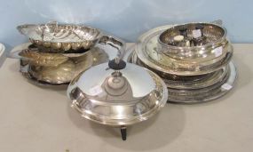 Group Lot of Silverplate Including a Bread Basket, Shell Dish, Round Trays with Reticulated Edges, a Salt and Pepper Shaker, Footed Dishes, Etc.