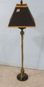 Tall Lamp with Black and Gold Shade.