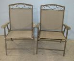 Two Outdoor Folding Chairs
