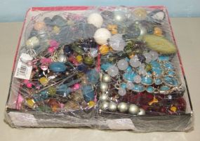 Two Boxes of Costume Jewelry Some with Tags