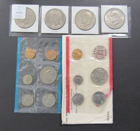 Four Ike Dollars and 1972 Mint Set