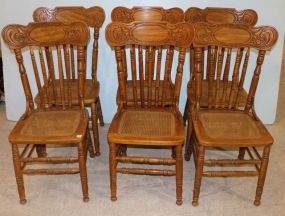 Six Oak Pressed Back with Cane Bottom Seat Dining Chairs