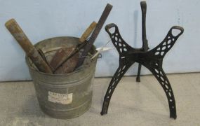 Galvanized Bucket with Miscellaneous Tools and a Iron Tripod Stand