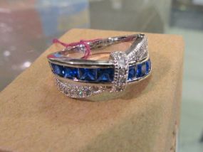 Band with Five Channel Set Blue Stones and Clear Stone Accents in Silvertone Setting
