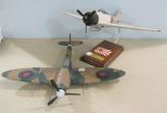 WWII Douglas Bader RAF Submarine Spitfire Model and a Mitsubishi JNAF A6M2 Zero Model on Stand