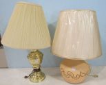 Two Lamps, One is Brass Plated and the Other is Ceramic with a Leaf Design