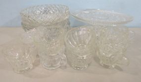 Fifteen Mismatched Punch Cups, Three Round Bowls and a Clear Cake Stand