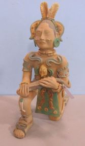 Large Kneeling Pottery Mayan Holding Lizard