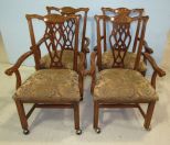 Four Chippendale Style Chairs on Castors with Upholstered Seats