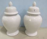 Two White Ceramic Temple Jars