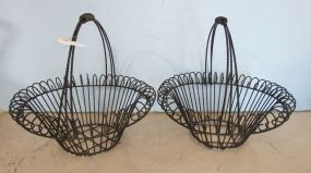 Two Wrought Iron Handled Baskets