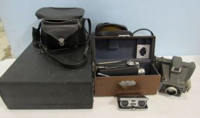 Collection of Vintage Cameras and Fairchild Galaxy 900 Projector