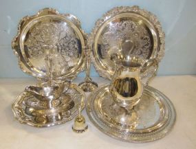 Group of Silver Plate Pitcher, Candleholders, and Serving Dishes